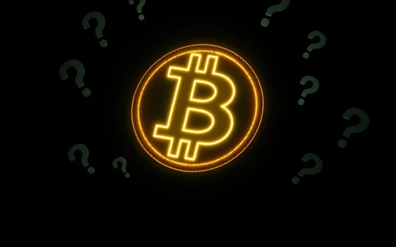 Mysterious Bitcoin symbol with question marks highlighting cryptocurrency uncertainty