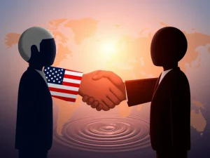 Two hands shaking, representing the US and EU, signifying a landmark US-EU Trade Deal that promises economic stability.
