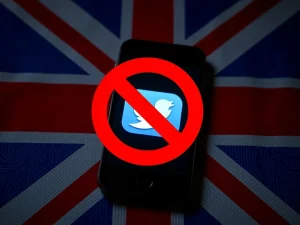 Concept of UK social media ban for under-16s with smartphone and prohibition symbol.