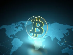 Bitcoin symbol over global financial network map showing adoption growth despite price decline