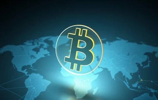 Bitcoin symbol over global financial network map showing adoption growth despite price decline