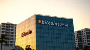 Bermuda skyline with Bitcoin Suisse office building at sunset, representing regulated crypto expansion