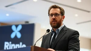 Brad Garlinghouse speaking at a press event, clarifying his role in the XRP community