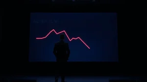 Silhouette of a person analyzing a downward trending crypto market sentiment graph on a large screen in a dark office.
