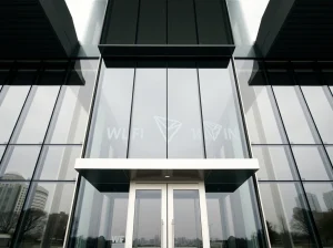 Exterior of a modern courthouse with cryptocurrency symbols reflected in the glass, representing the World Liberty Financial lawsuit against Justin Sun.