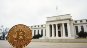 Bitcoin coin in foreground with the Federal Reserve building in background